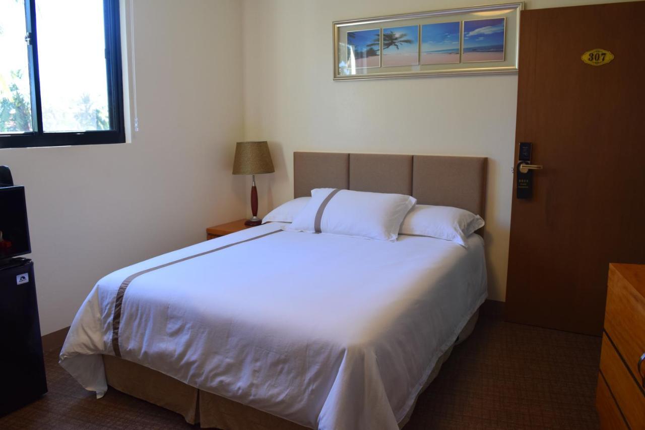 Saipan Beach Hotel Bagian luar foto
