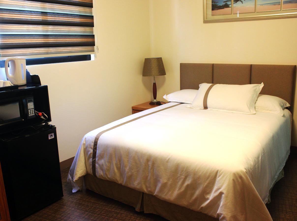 Saipan Beach Hotel Bagian luar foto