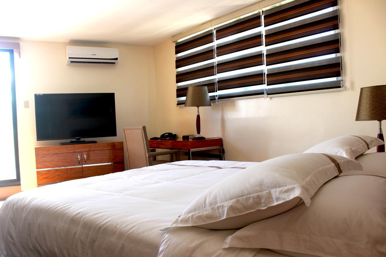 Saipan Beach Hotel Bagian luar foto