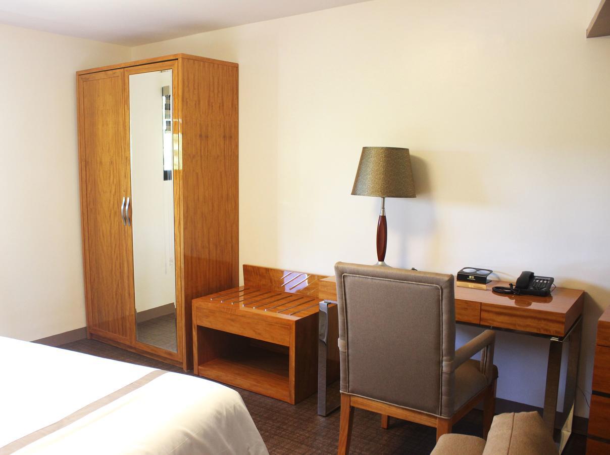 Saipan Beach Hotel Bagian luar foto