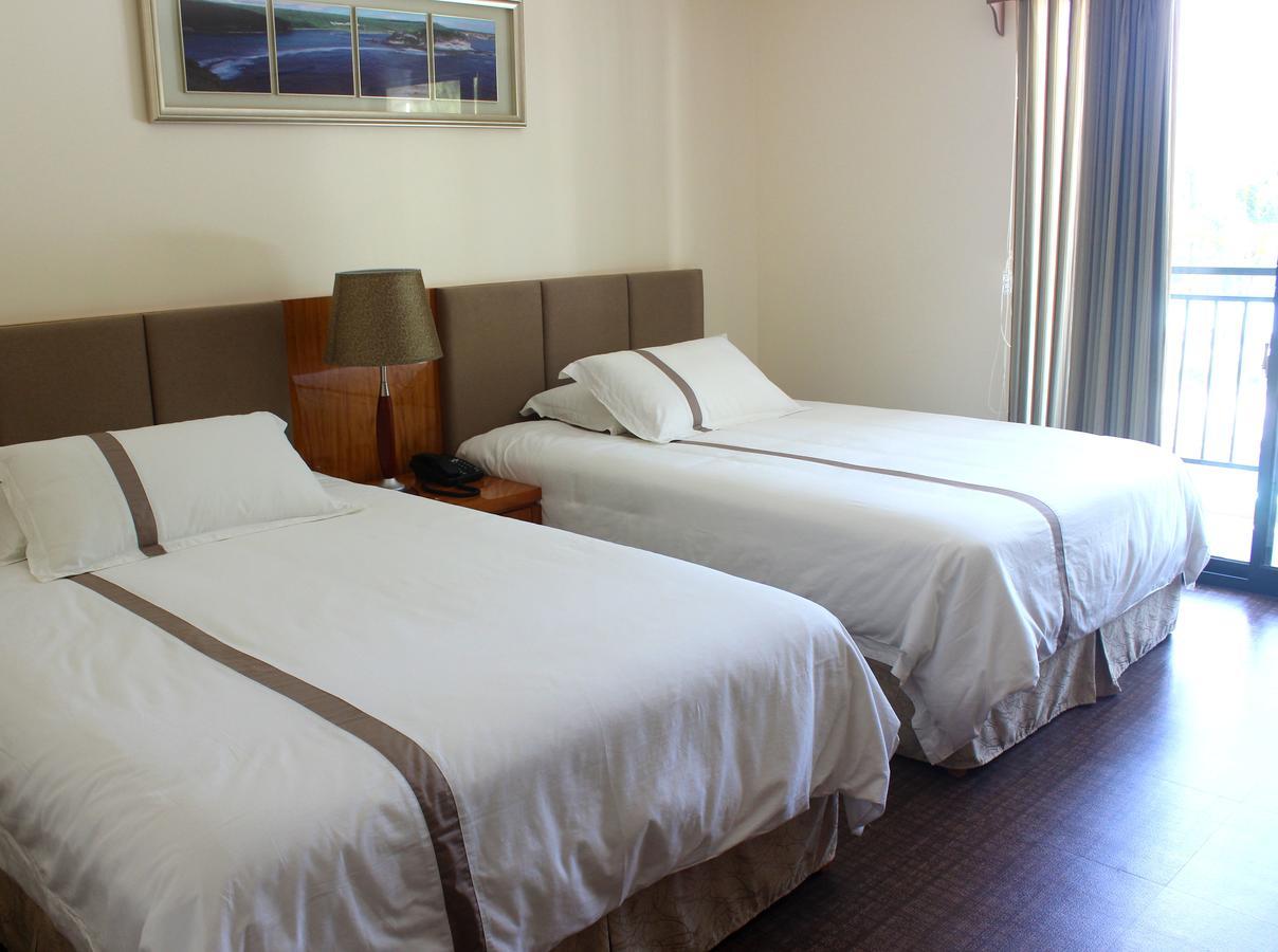 Saipan Beach Hotel Bagian luar foto