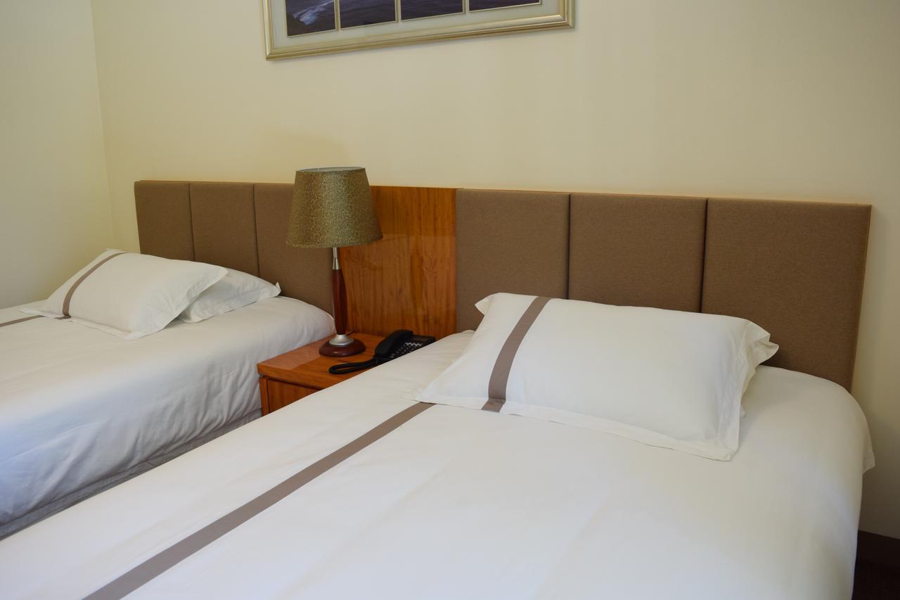 Saipan Beach Hotel Bagian luar foto