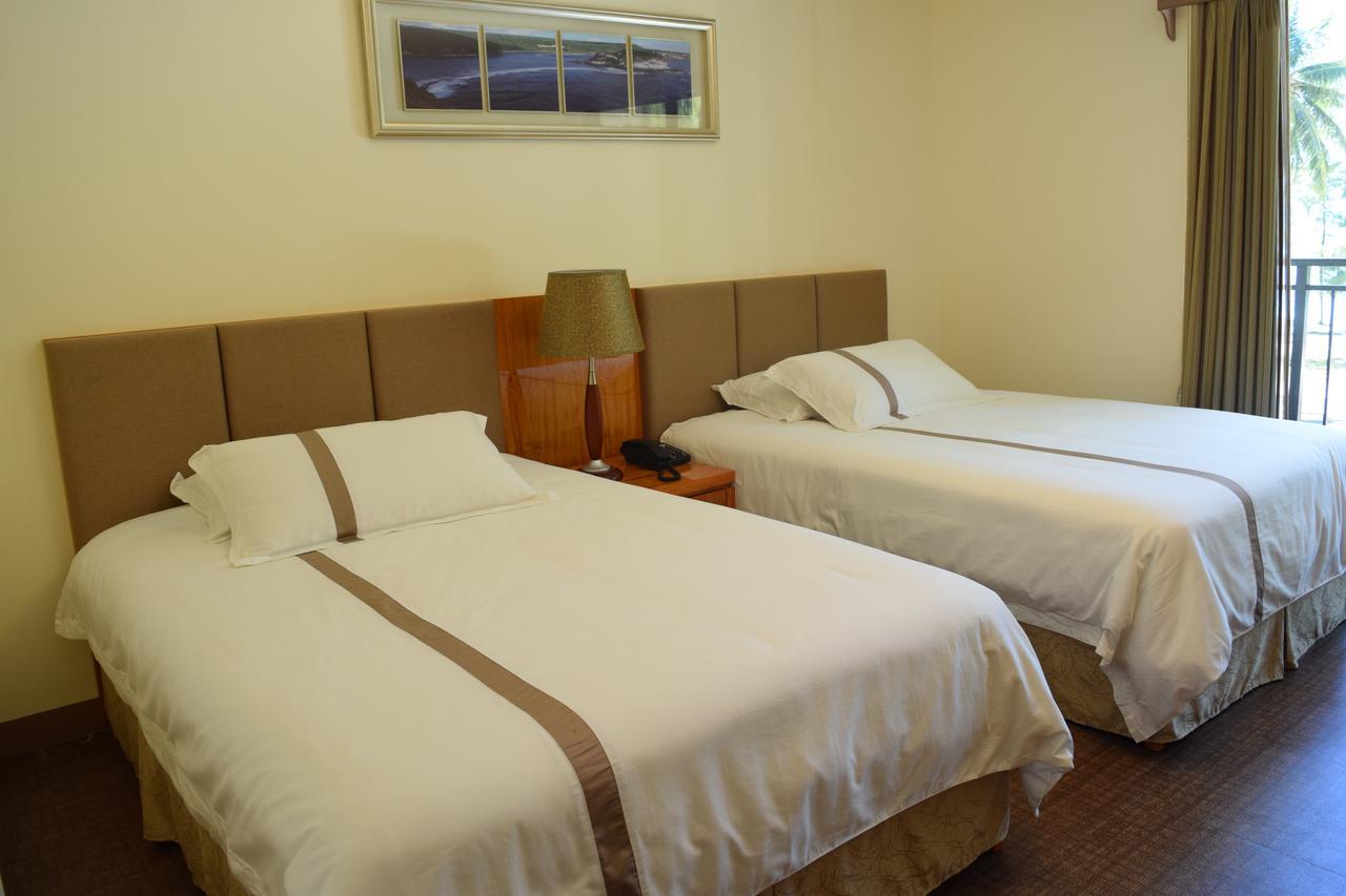 Saipan Beach Hotel Bagian luar foto