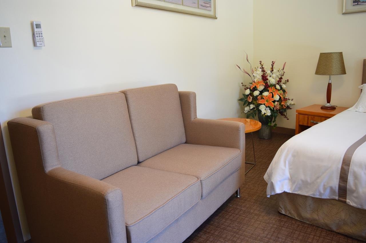 Saipan Beach Hotel Bagian luar foto
