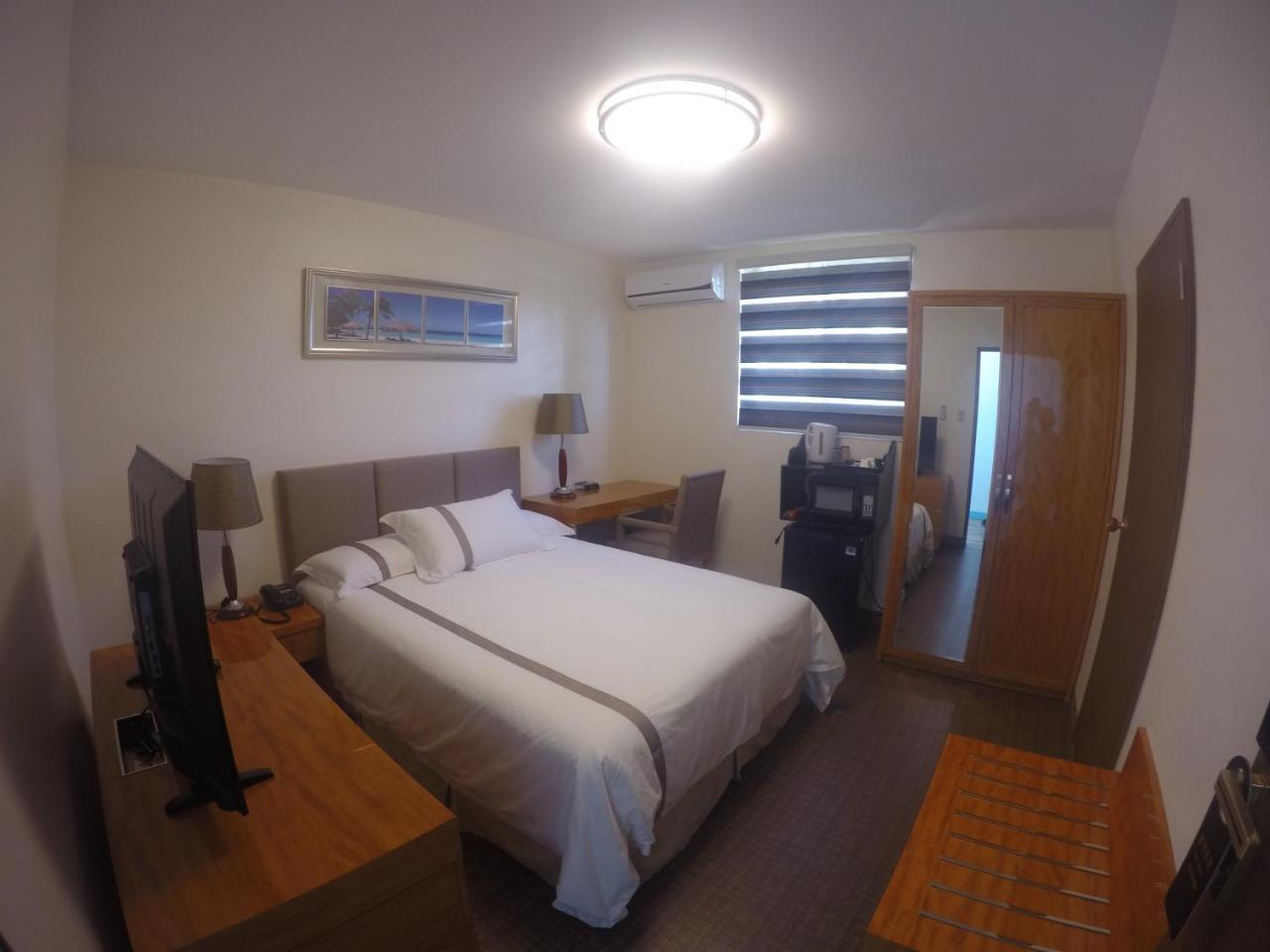 Saipan Beach Hotel Bagian luar foto
